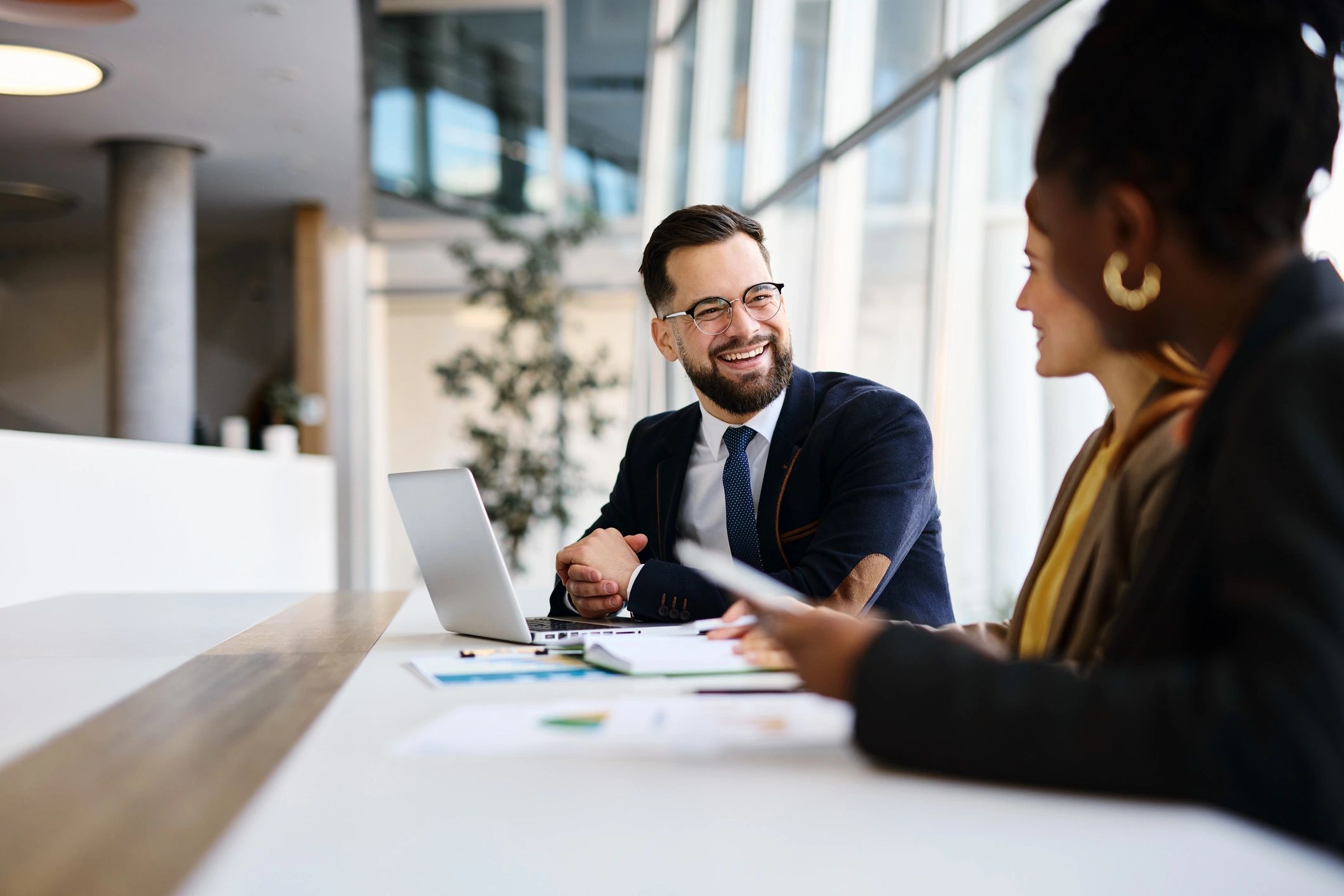 Two professionals collaborating during a strategy session