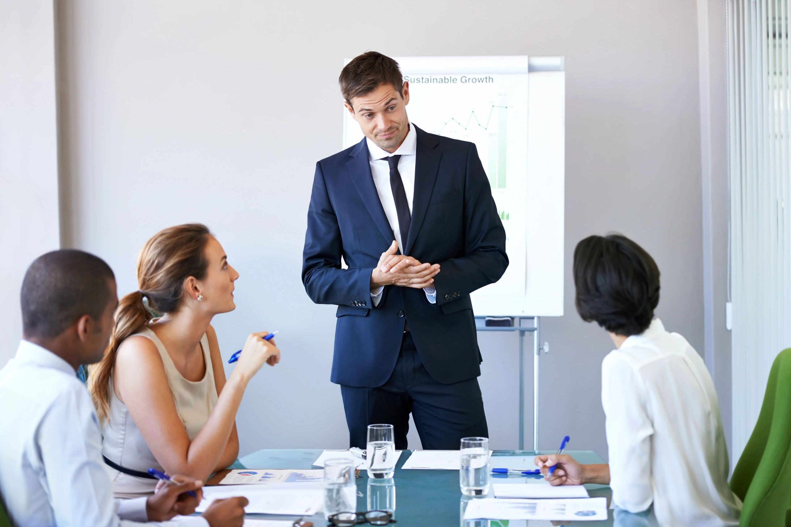 Business leader presenting to a team during a workshop